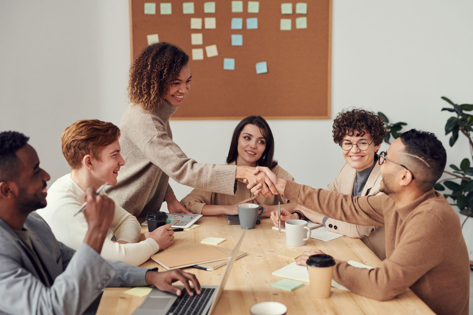 The JDS Filings team welcoming a new business client with a handshake