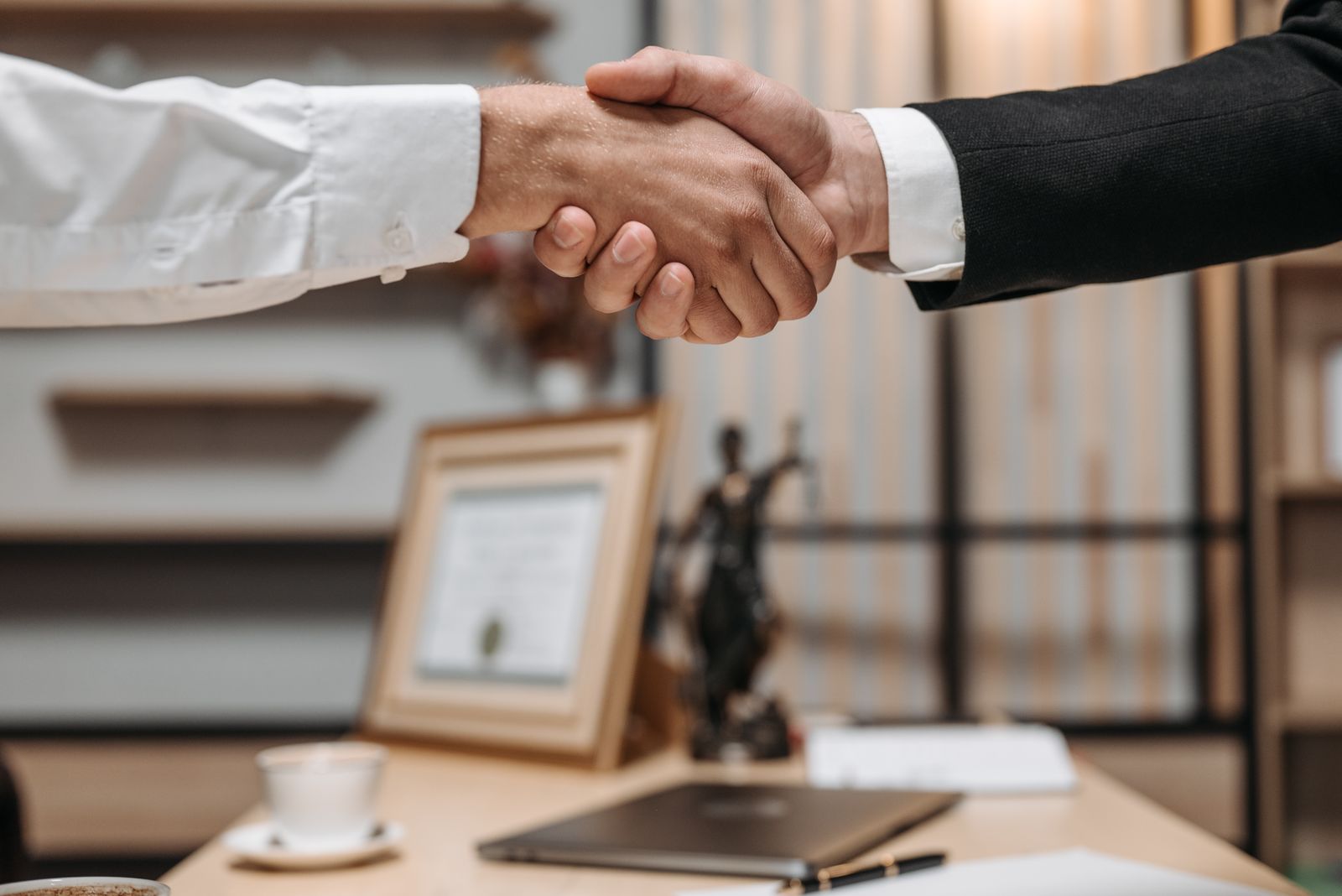 A professional handshake — JDS Filings partnering with a business owner